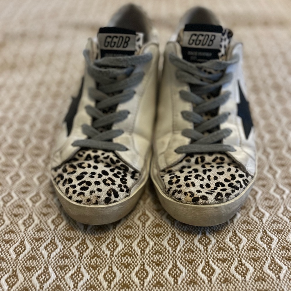Golden Goose White and Black Sneakers with Distressed Look